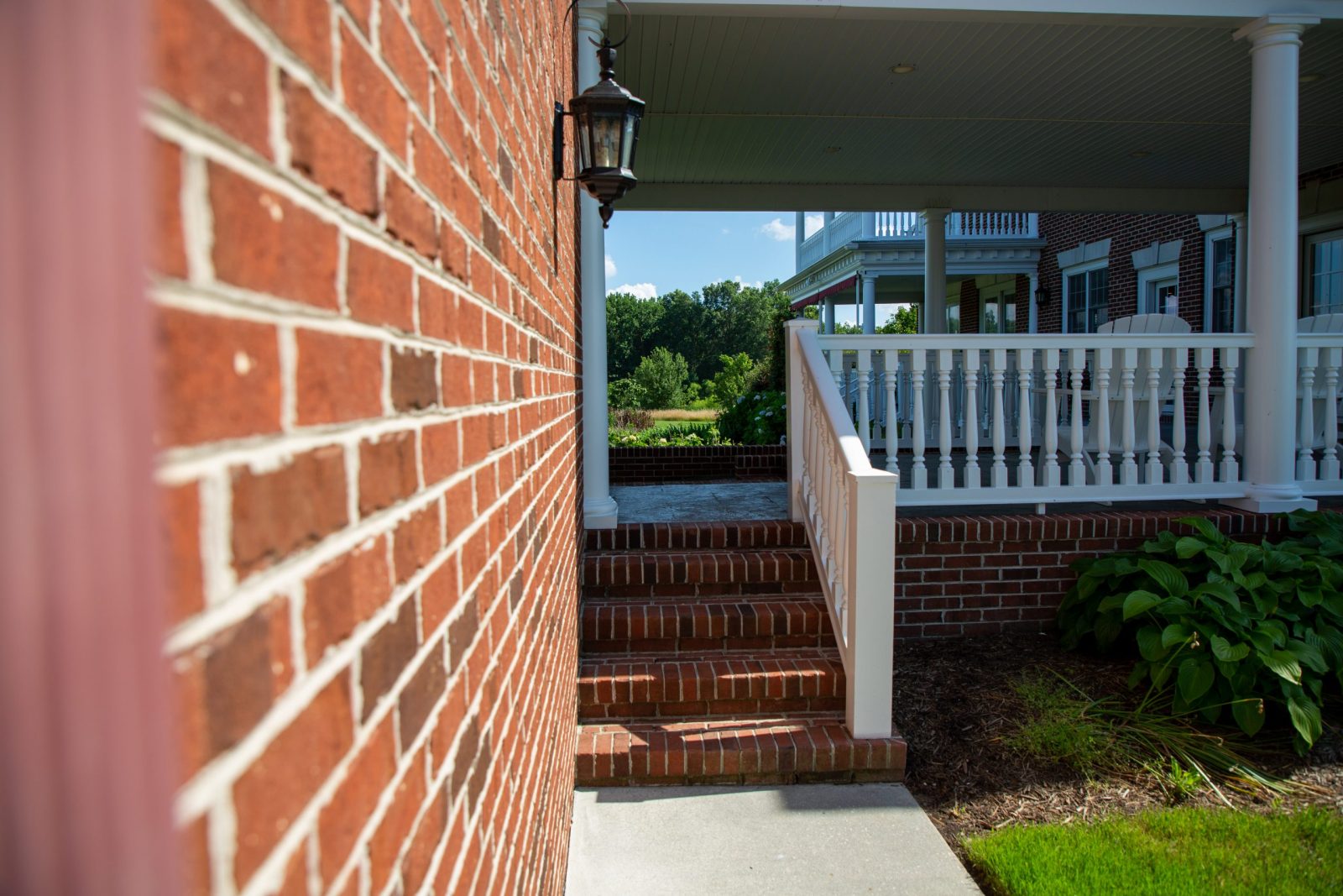Brick wall and railing on outdoor brick staircase