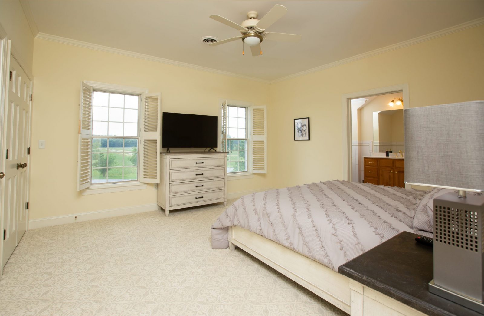 Light grey linens, bedroom view